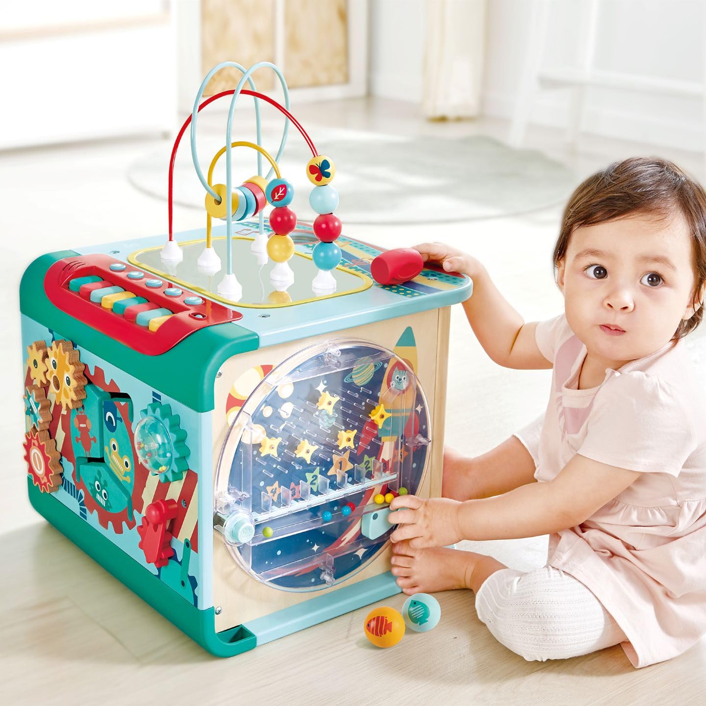 Hape Magischer Motorikwürfel, Motorikspielzeug, mit Sound-Funktion, ab 12 Monaten
